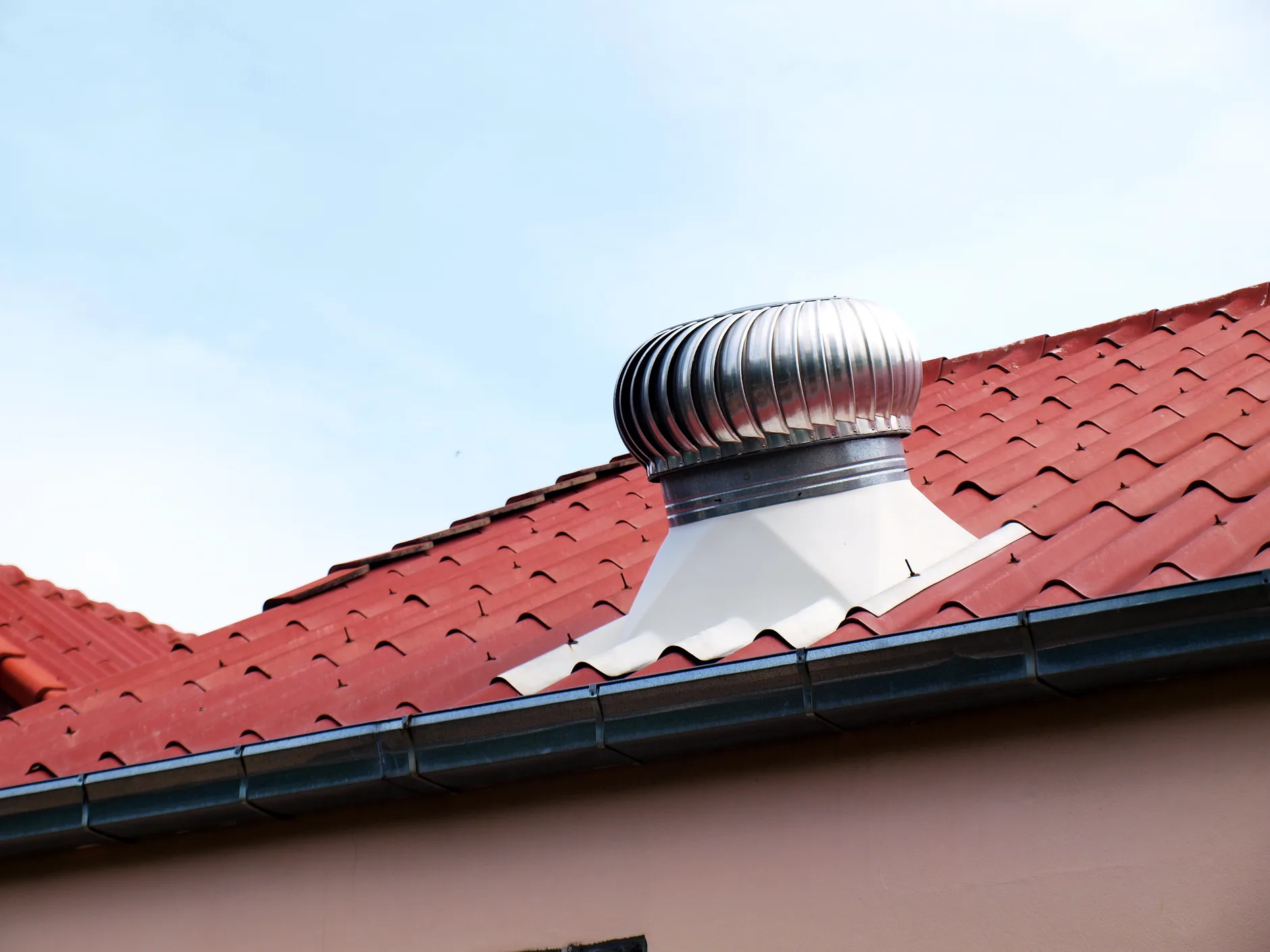 Attic ventilation system with ridge vent and soffit vents